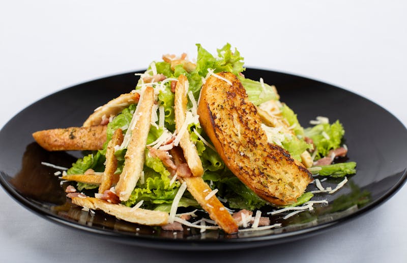 Classic Caesar salad with croutons and parmesan