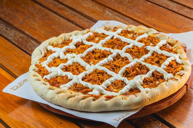 Spicy sausage and jalapeño deep dish pizza